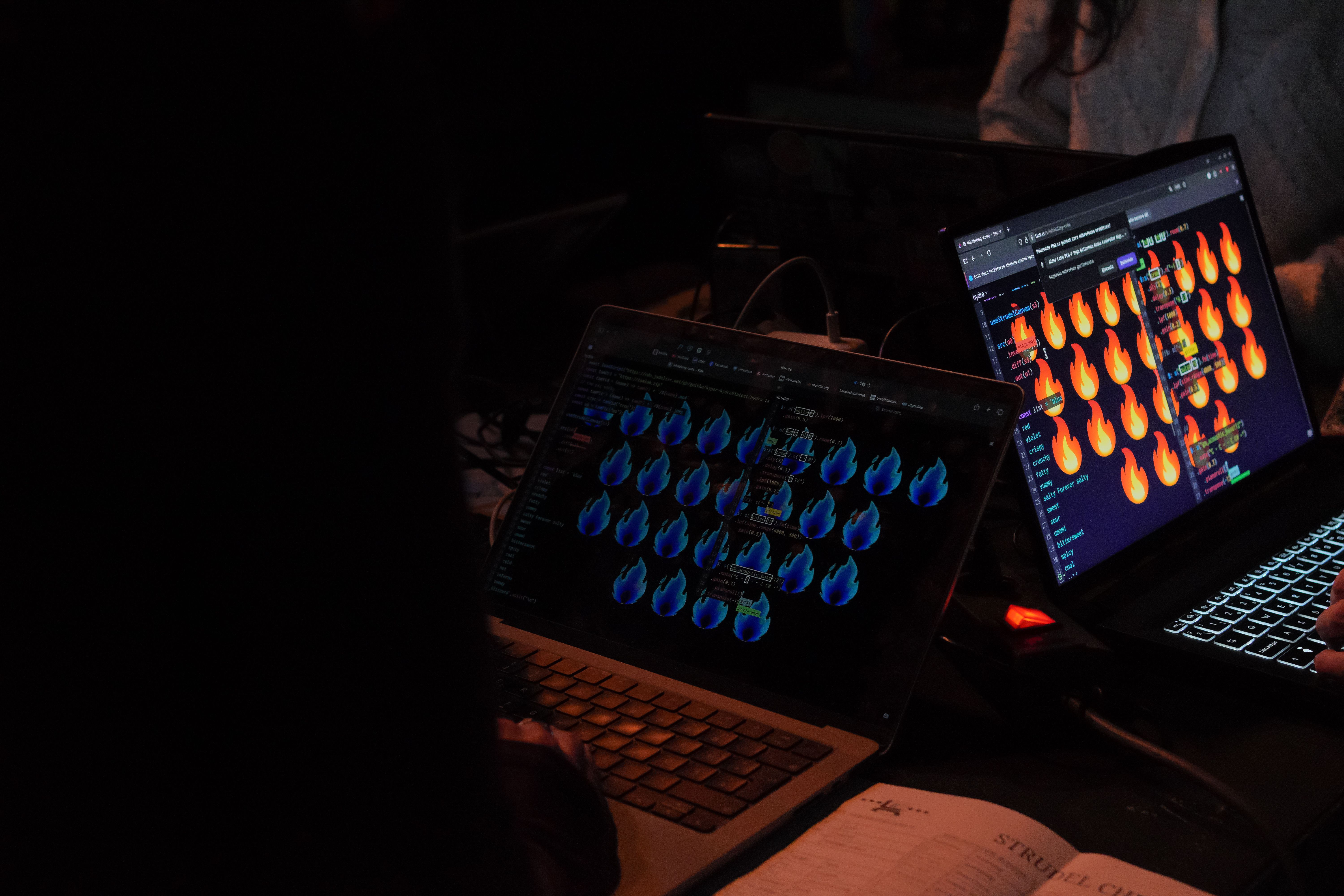 Laptops on fire. Photo by Linaá Pulido